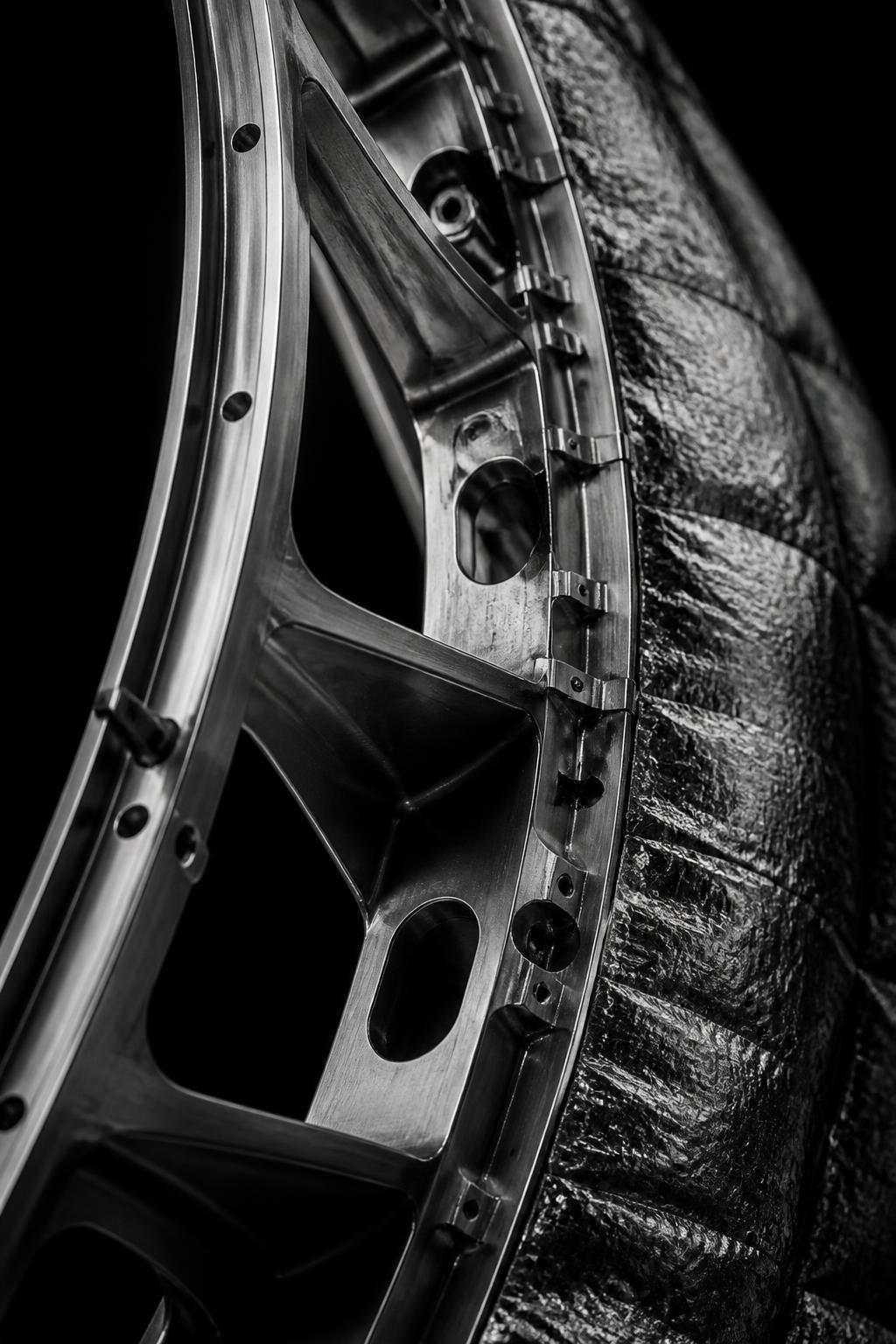 Monochrome view of aerospace structural hardware under assembly lighting
